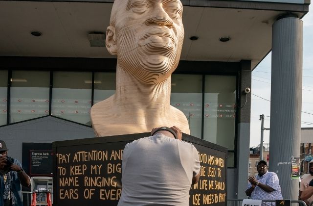 Terrance Floyd weeps during the unveiling of a statute dedicated to his brother George Floyd at Flatbush Junction on June 19, 2021