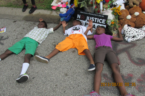 ferguson kids on ground.jpg