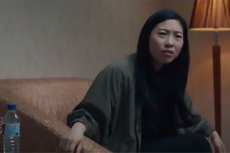 The Farewell and Akwafina. Asian woman with long dark hair and nose ring.