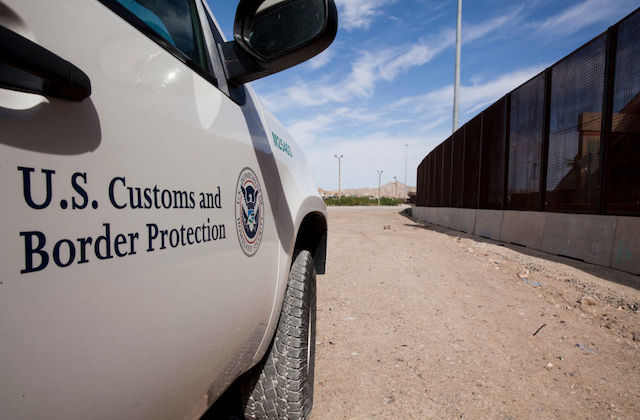 Vehicle shown with U.S. Customs and Border Protection written in black on the white door. 