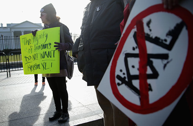 Activists protest in front of the White House against the Keystone XL pipeline January 13, 2015, in Washington, D.C.