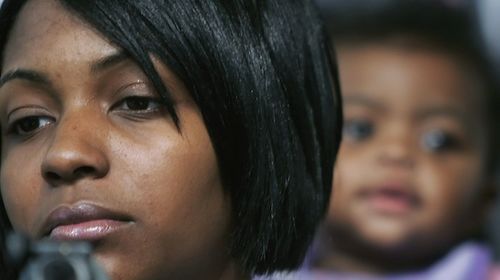 Nicole Paultre-Bell with her and Sean Bell's baby Jordan in March 14, 2007 in New York City.