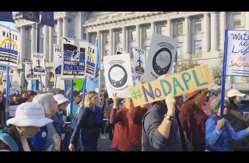 Colorlines screenshot of #DayofAction video by Greenpeace USA on Twitter, taken on November 15, 2016.