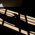 A shadow is cast of a cell door of a male prison on March 15, 2017, in Wrexham, Wales.