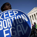 A pro-choice activist  in front of the the U.S. Supreme Court in Washington, DC. 